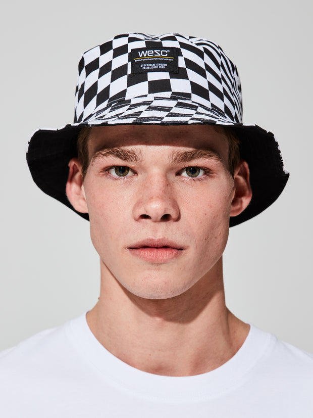 WARPED CHECKER REVERSIBLE BUCKET HAT